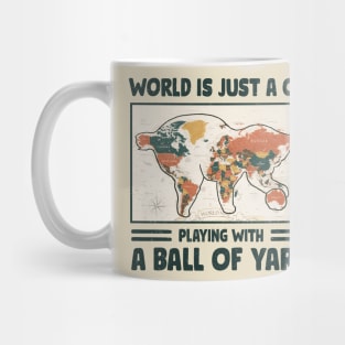 Funny crochet saying |  World is just a cat playing with a ball of yarn Mug